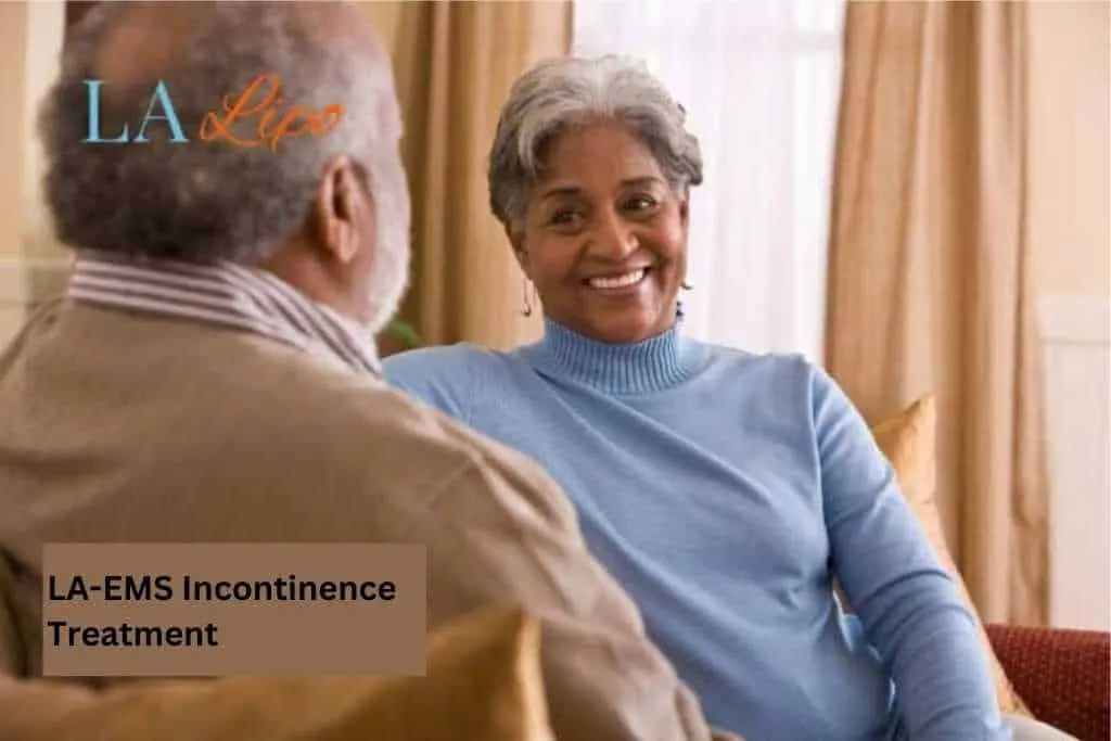 Couple sat smiling at each other - LA-EMS treatment Weybridge