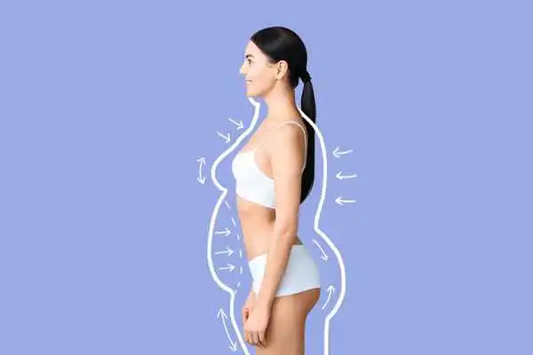 image of woman experiencing fat reduction treatment Weybridge