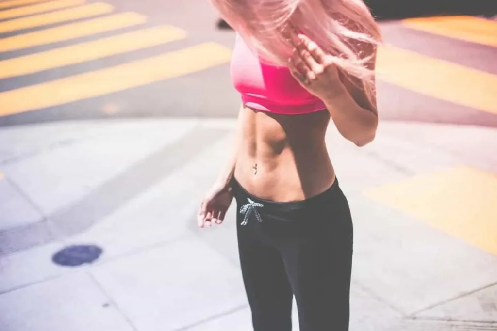 Woman with toned stomach after LA-EMS Body Sculpting Treatment Weybridge